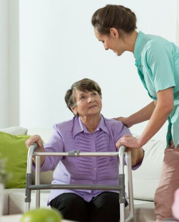Senior Home Care Client Being Assisted by Private Home Care Aide in Philadelphia, PA